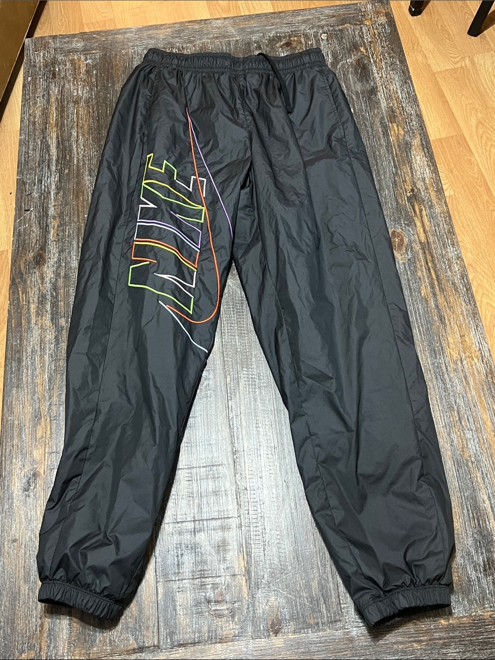 Nike Black Men's Windbreaker Joggers with Multicolor Outline Logo
